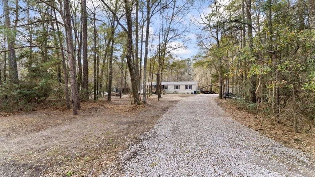 Photo of 212 Highland Drive, Huntsville, TX 77320 (MLS # 24973950)