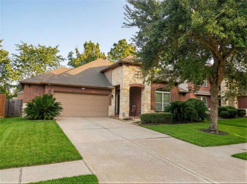 Photo of 129 Autumn Forest Lane, Conroe, TX 77384 (MLS # 96576743)