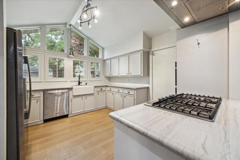 Photo of 10002 Wickersham Lane, Houston, TX 77042 (MLS # 10975728)