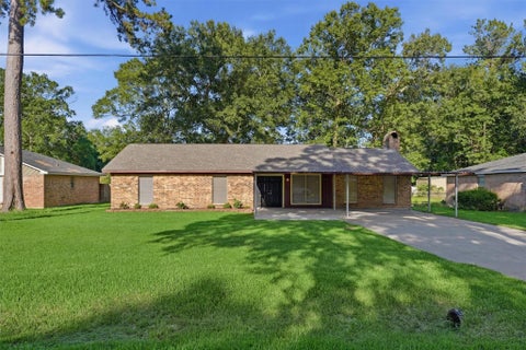 Photo of 1305 Denison Avenue, Cleveland, TX 77327 (MLS # 37042479)