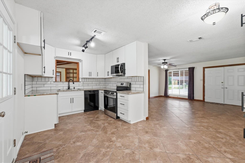Photo of 1305 Denison Avenue, Cleveland, TX 77327 (MLS # 37042479)