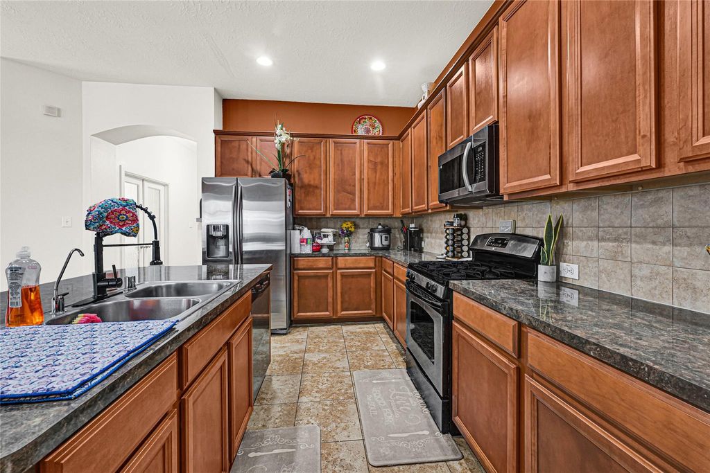 Photo of 12739 Bridle Springs Lane, Houston, TX 77044 (MLS # 45173352)