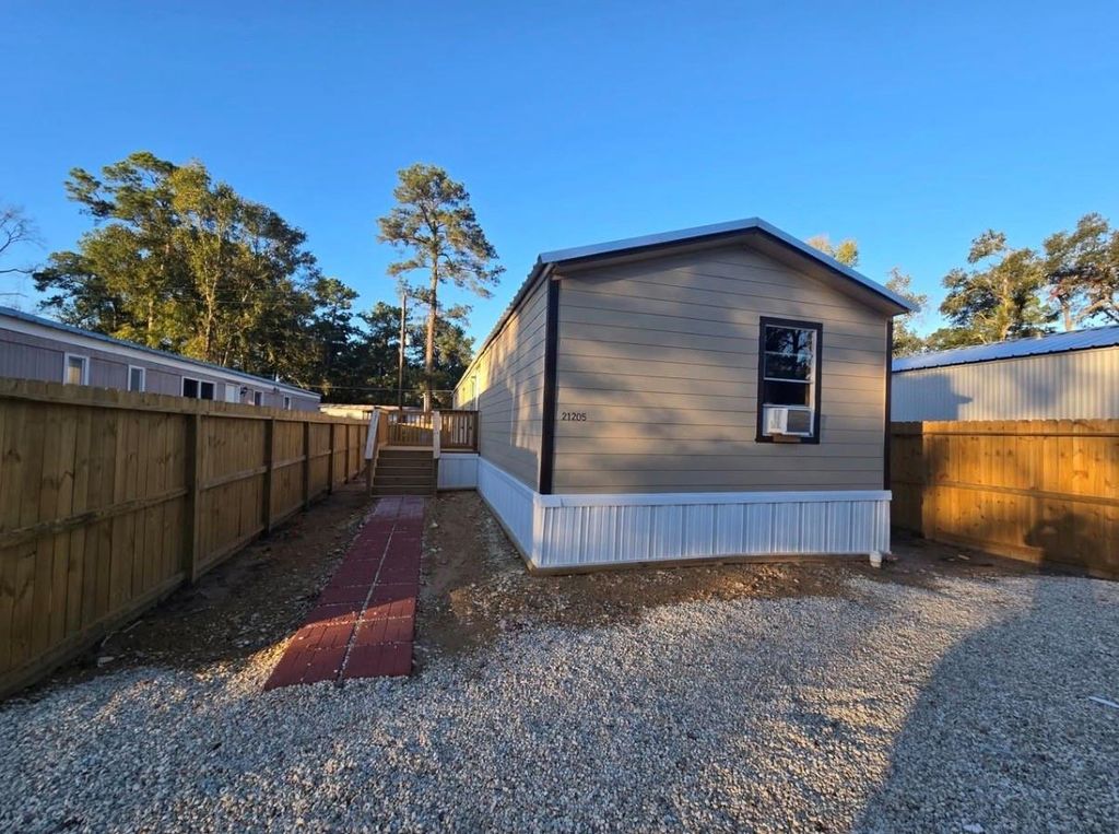 Photo of 21205 Brazos Drive, New Caney, TX 77357 (MLS # 12354397)