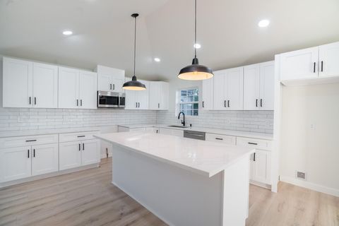 Photo of 1310 E 34th Street, Houston, TX 77022 (MLS # 19564023)