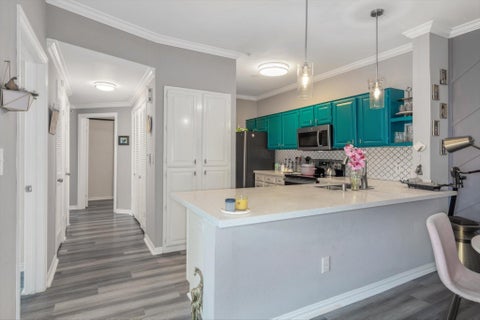 Photo of 2111 Welch Street #B201, Houston, TX 77019 (MLS # 64849425)