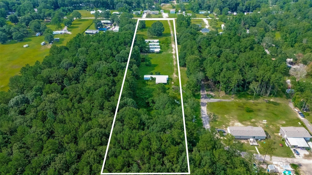Photo of 905 County Road 379, Cleveland, TX 77328 (MLS # 58548574)