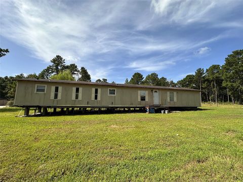 Photo of 8268 Tupelo Lane, Plantersville, TX 77363 (MLS # 83439069)