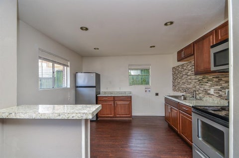 Photo of 7521 Bauman Road, Houston, TX 77022 (MLS # 48438317)