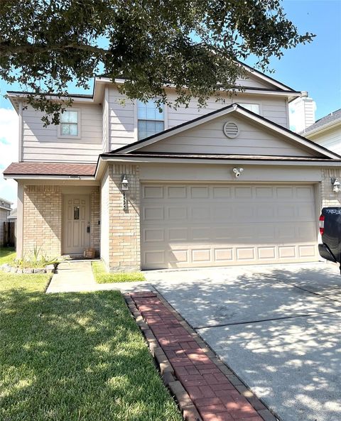 Photo of 9523 Brandon Rock Lane, Houston, TX 77044 (MLS # 60376654)