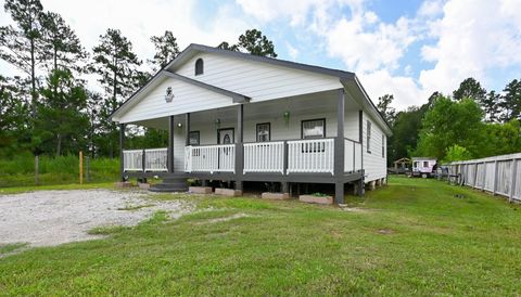 Photo of 905 County Road 5015, Cleveland, TX 77327 (MLS # 19472829)