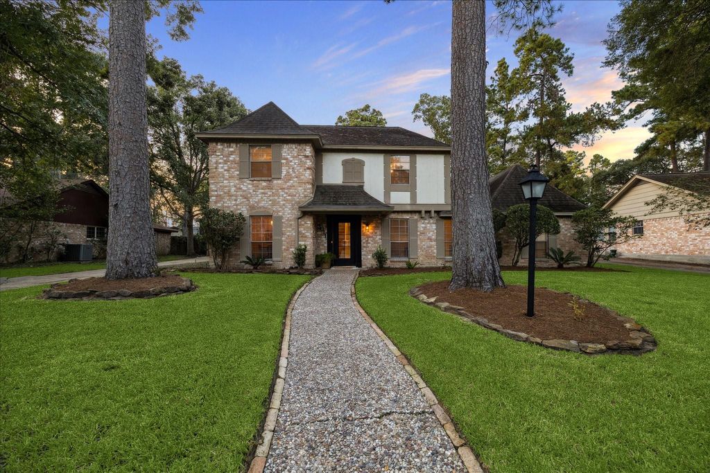 Photo of 3011 Redwood Lodge Drive, Houston, TX 77339 (MLS # 51322102)