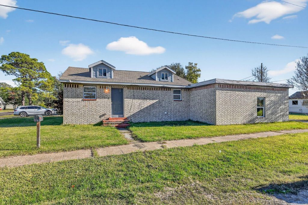 Photo of 1548 W 5th Street, Port Arthur, TX 77640 (MLS # 53568895)