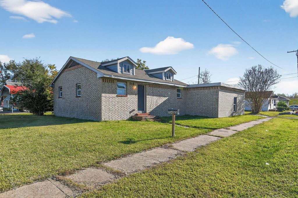Photo of 1548 W 5th Street, Port Arthur, TX 77640 (MLS # 53568895)