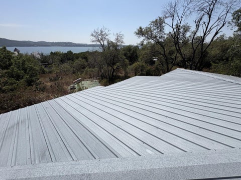 Photo of 7085 Comanche Trail, Austin, TX 78732 (MLS # 55203412)