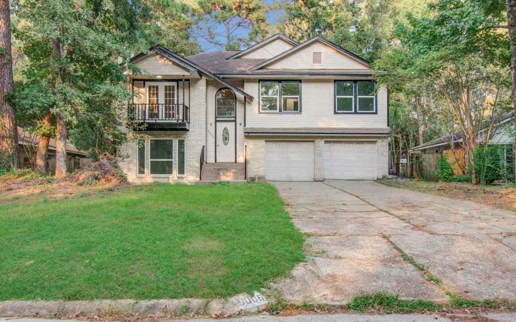 Photo of 5006 Village Springs Drive, Houston, TX 77339 (MLS # 34977516)