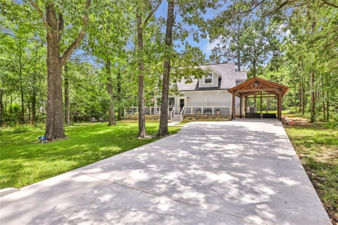 Photo of 561 N Royale Greens Drive, Coldspring, TX 77331 (MLS # 24034625)
