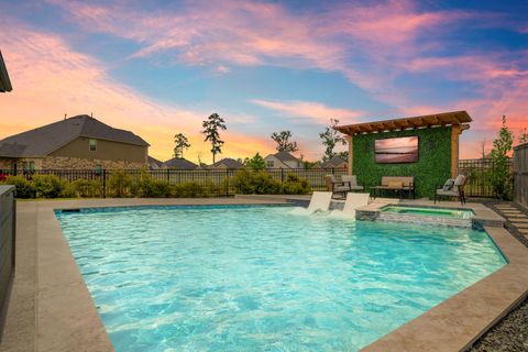 Photo of 9715 Migrant Hawker Court, Conroe, TX 77385 (MLS # 72569087)