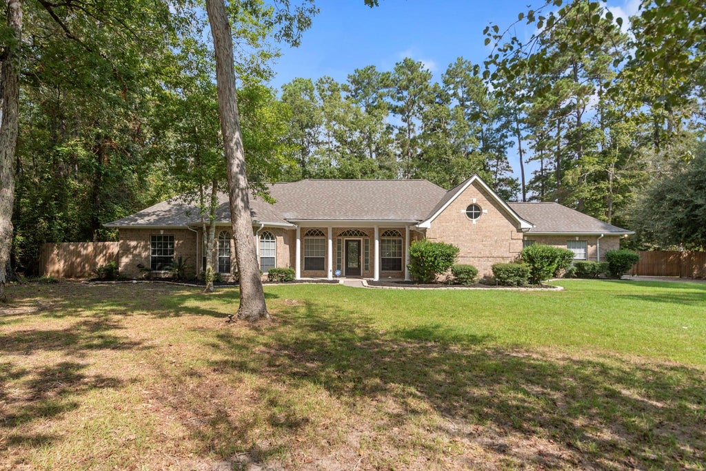 Photo of 2615 Roman Forest Boulevard, New Caney, TX 77357 (MLS # 27156763)