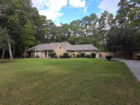 Photo of 2615 Roman Forest Boulevard, New Caney, TX 77357 (MLS # 27156763)