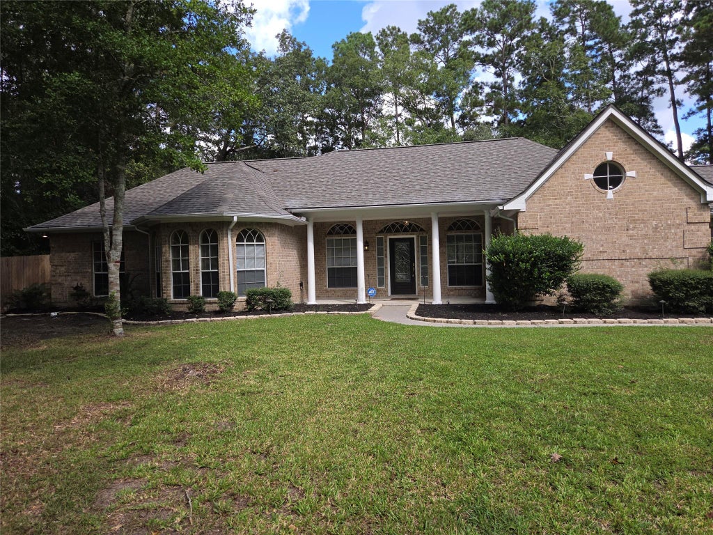Photo of 2615 Roman Forest Boulevard, New Caney, TX 77357 (MLS # 27156763)