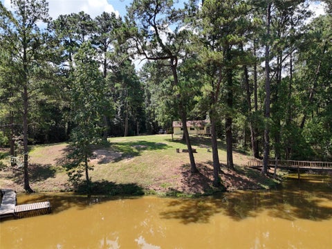 Photo of TBD James Lane, Coldspring, TX 77331 (MLS # 75211063)