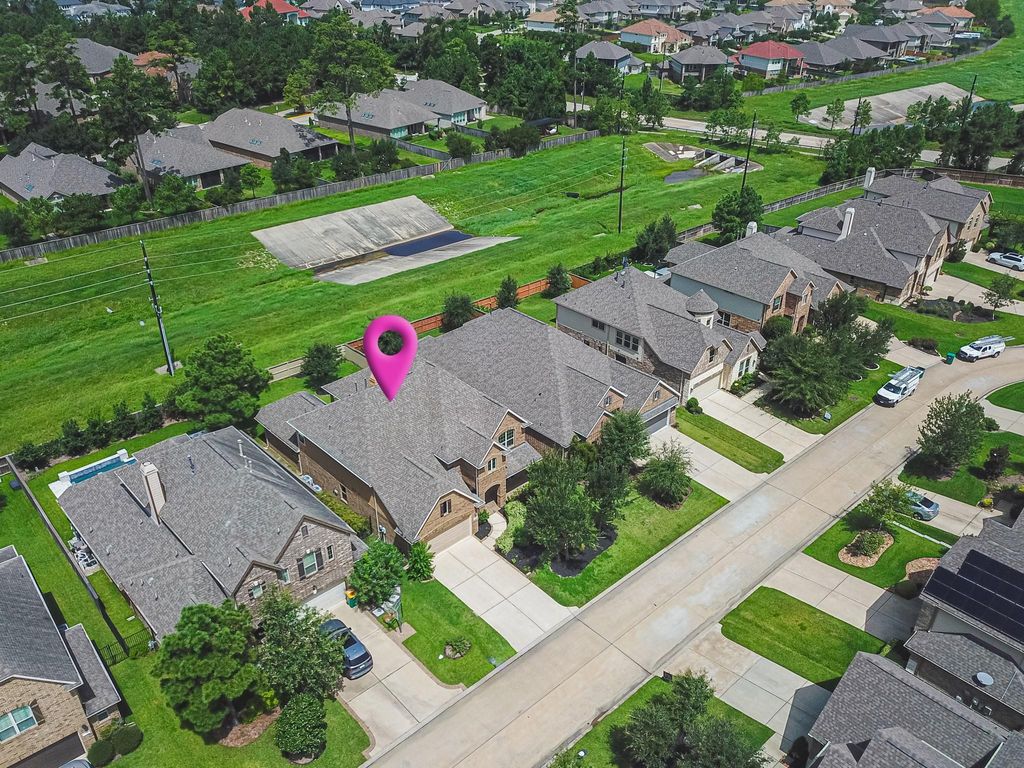 Photo of 54 Wyatt Oaks Drive, Tomball, TX 77375 (MLS # 18107344)