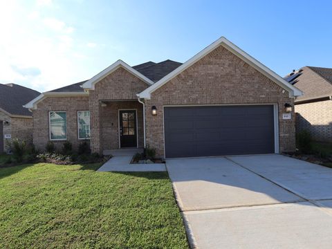 Photo of 830 Falling Cave Drive, Willis, TX 77378 (MLS # 54490228)