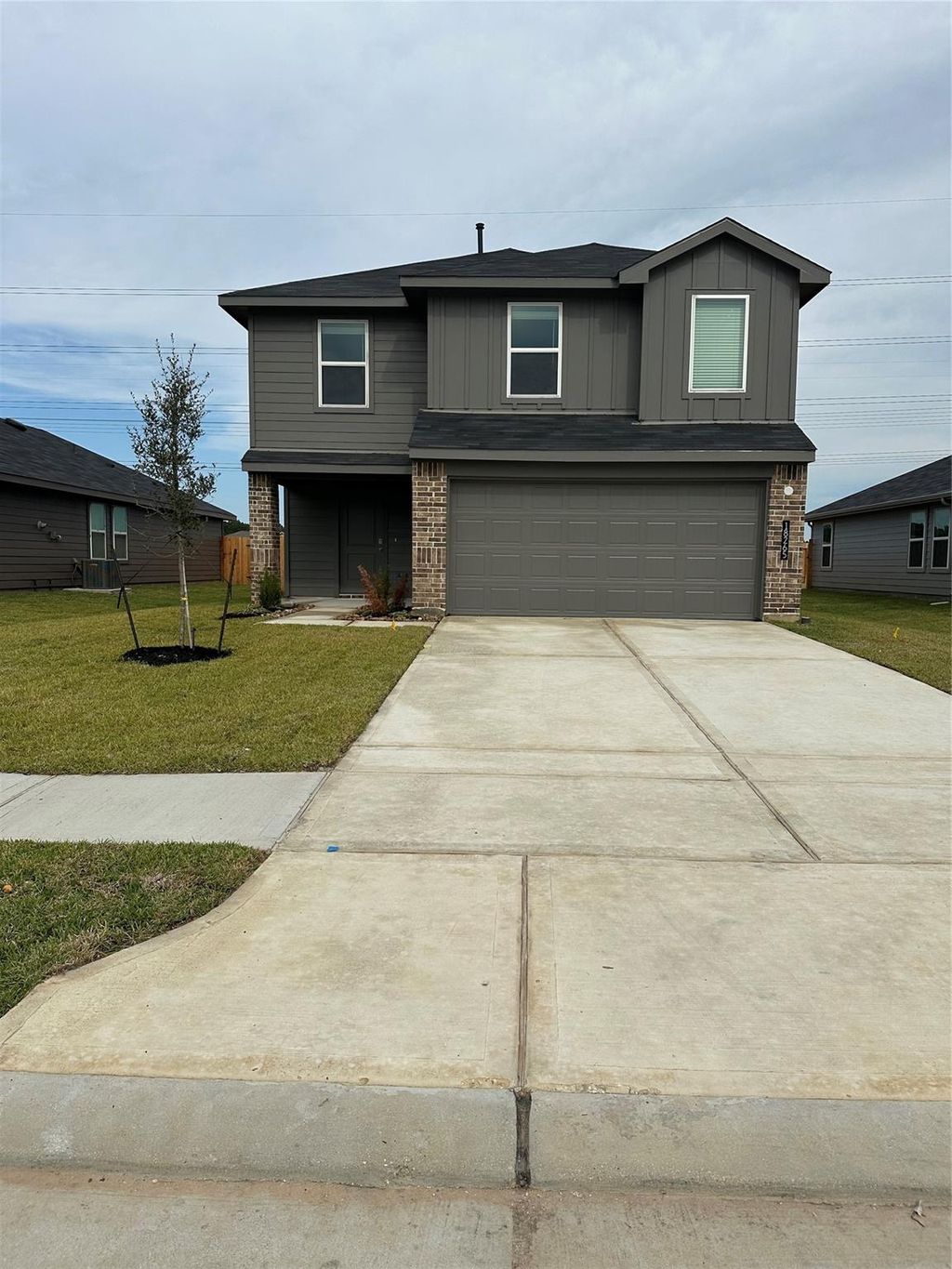 Photo of 18265 Descartes St, New Caney, TX 77357 (MLS # 22064880)