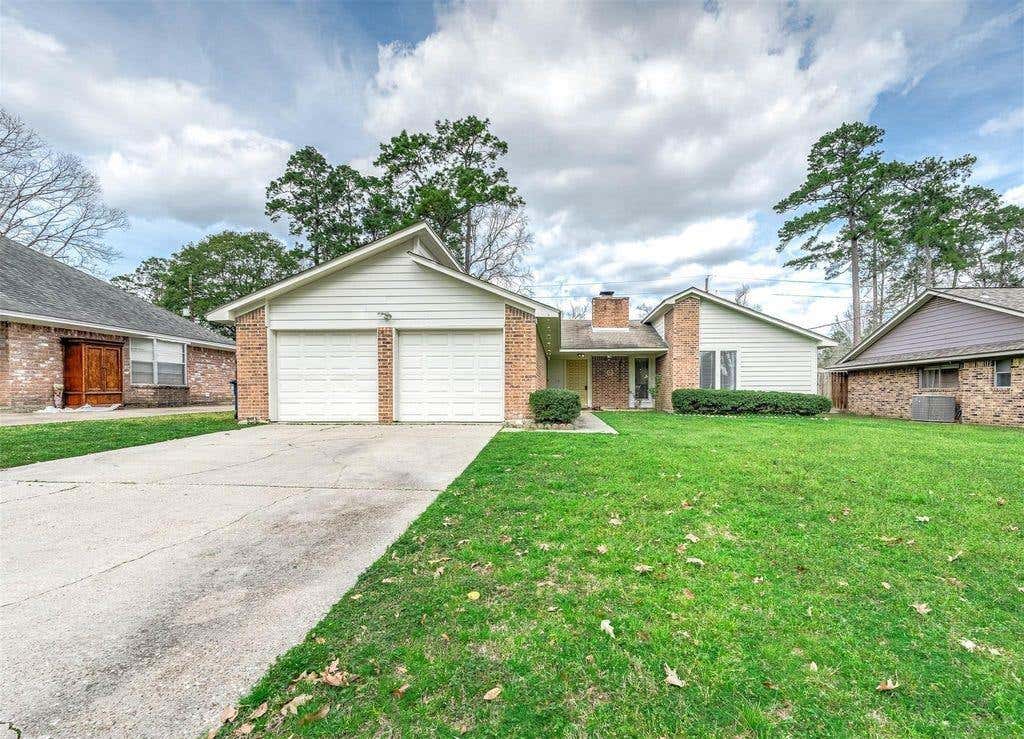Photo of 1903 Woodway Drive Dr, Woodbranch, TX 77357 (MLS # 55224407)