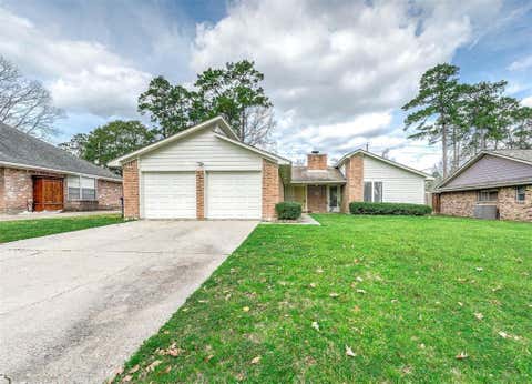 Photo of 1903 Woodway Drive Dr, Woodbranch, TX 77357 (MLS # 55224407)