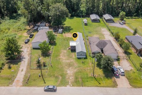 Photo of 300 County Road 3554, Cleveland, TX 77327 (MLS # 31331668)