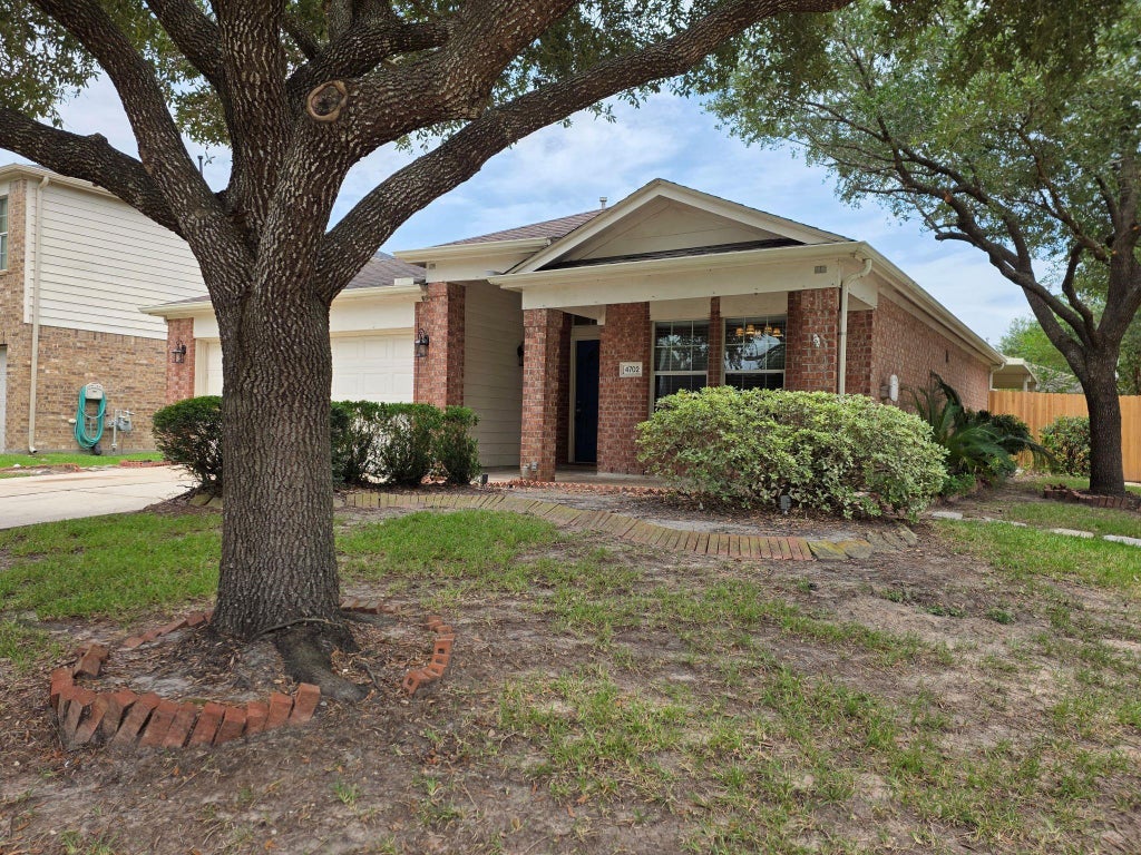 Photo of 4702 Pin Oak Creek Lane, Kingwood, TX 77345 (MLS # 55807647)