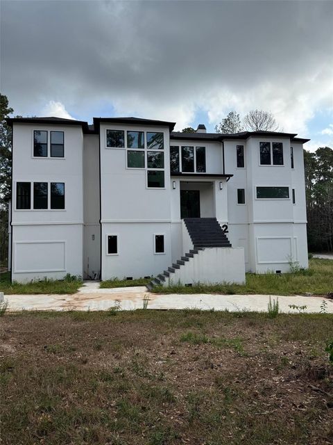 Photo of 2 Deer Ridge Estates Boulevard, Houston, TX 77339 (MLS # 16518155)