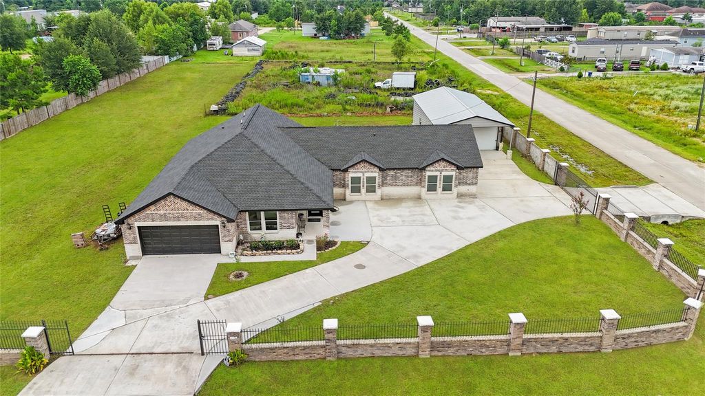 Photo of 158 County Road 3550, Cleveland, TX 77327 (MLS # 84868776)