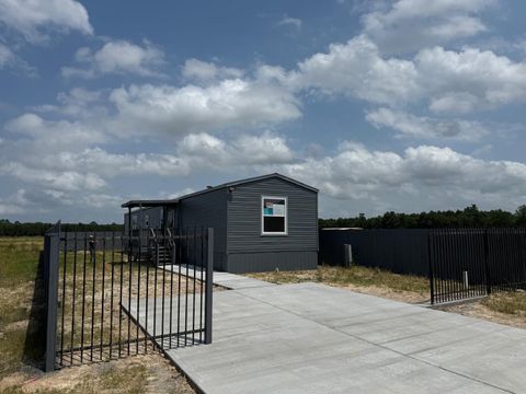 Photo of 181 Road 591701, Cleveland, TX 77327 (MLS # 24891334)