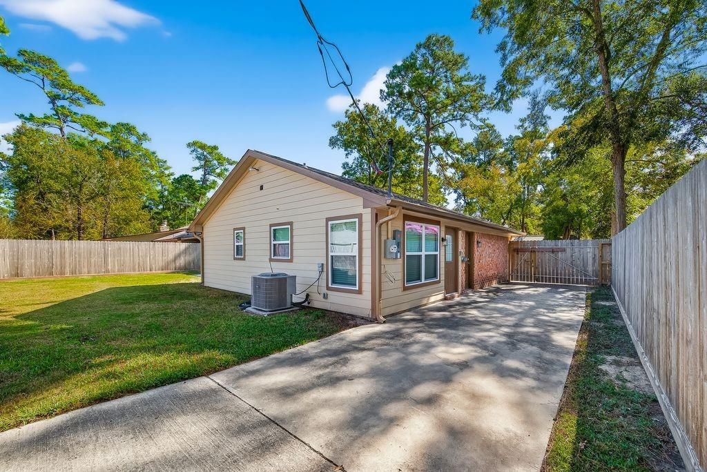 Photo of 2103 Woodway Drive, New Caney, TX 77357 (MLS # 14886621)