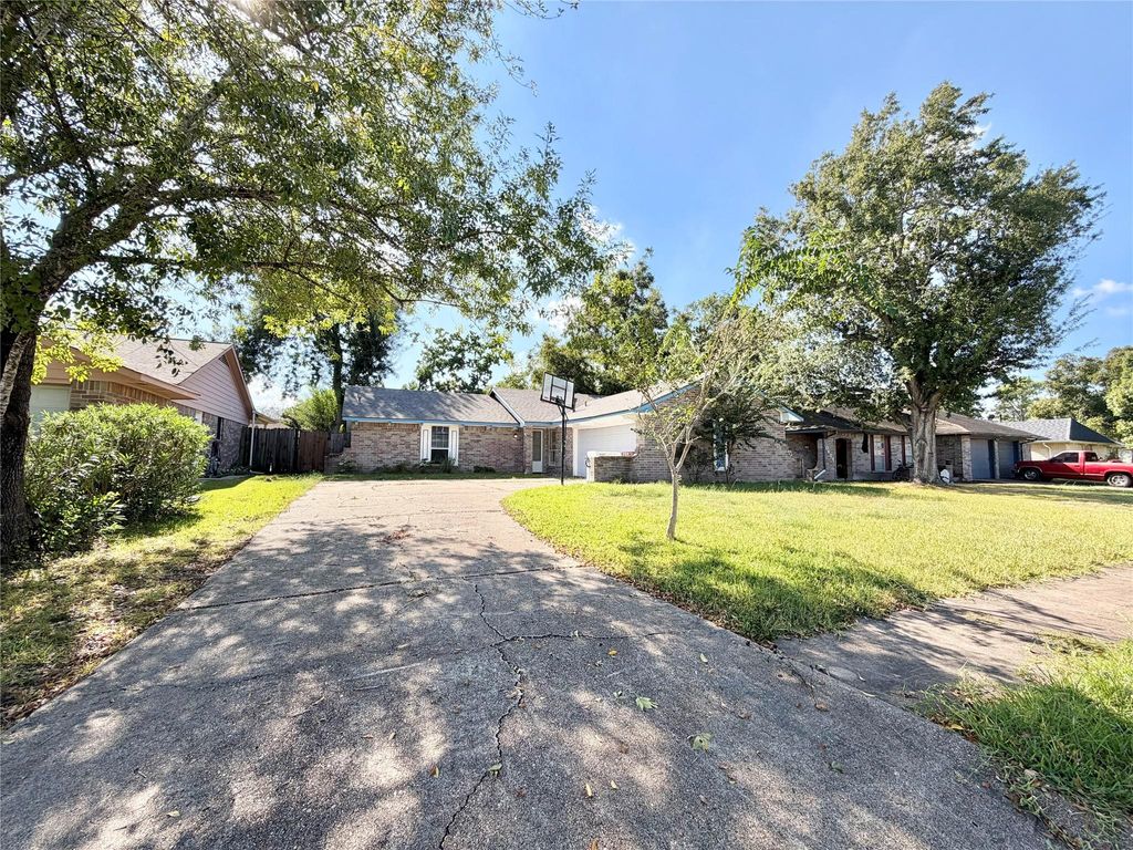 Photo of 10410 Sagetrail Drive, Houston, TX 77089 (MLS # 92786309)