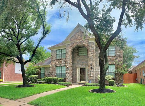 Photo of 11210 Chestnut Woods Trail, Houston, TX 77065 (MLS # 7137486)