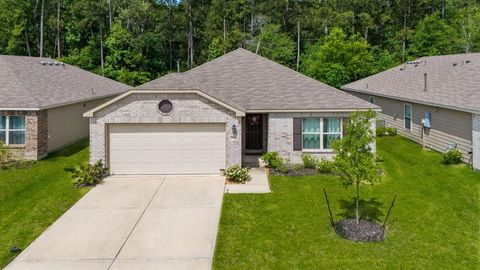 Photo of 9931 Spring Creek Road, Cleveland, TX 77327 (MLS # 96637916)