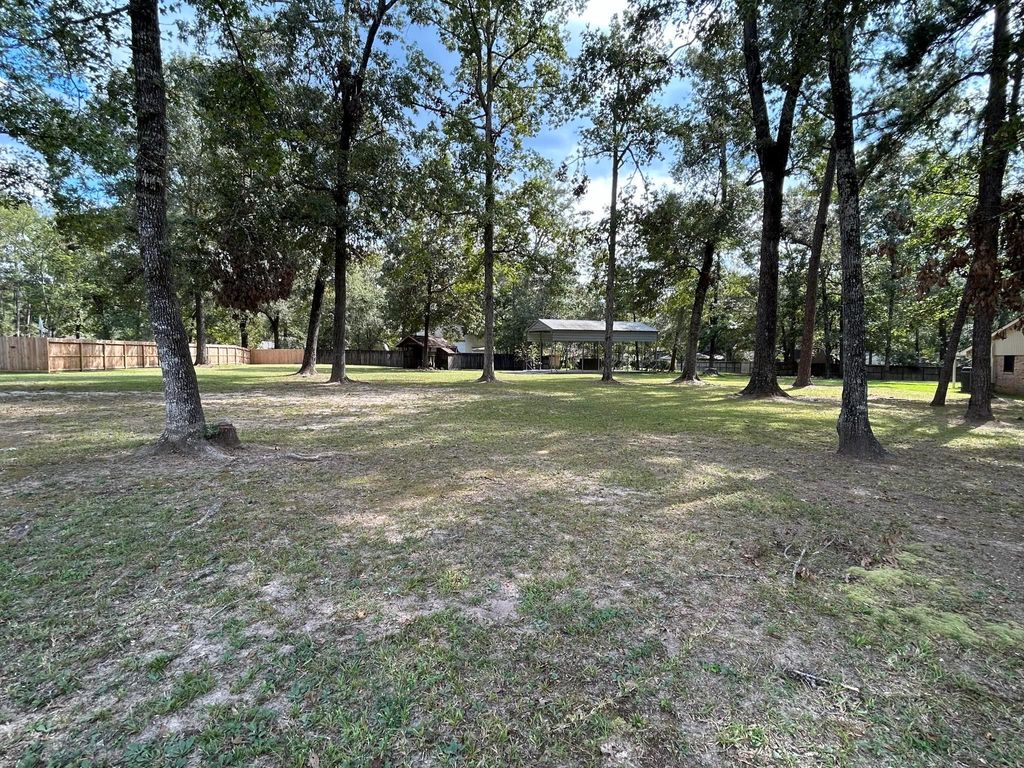 Photo of 2006 Roman Forest Boulevard, New Caney, TX 77357 (MLS # 11339036)