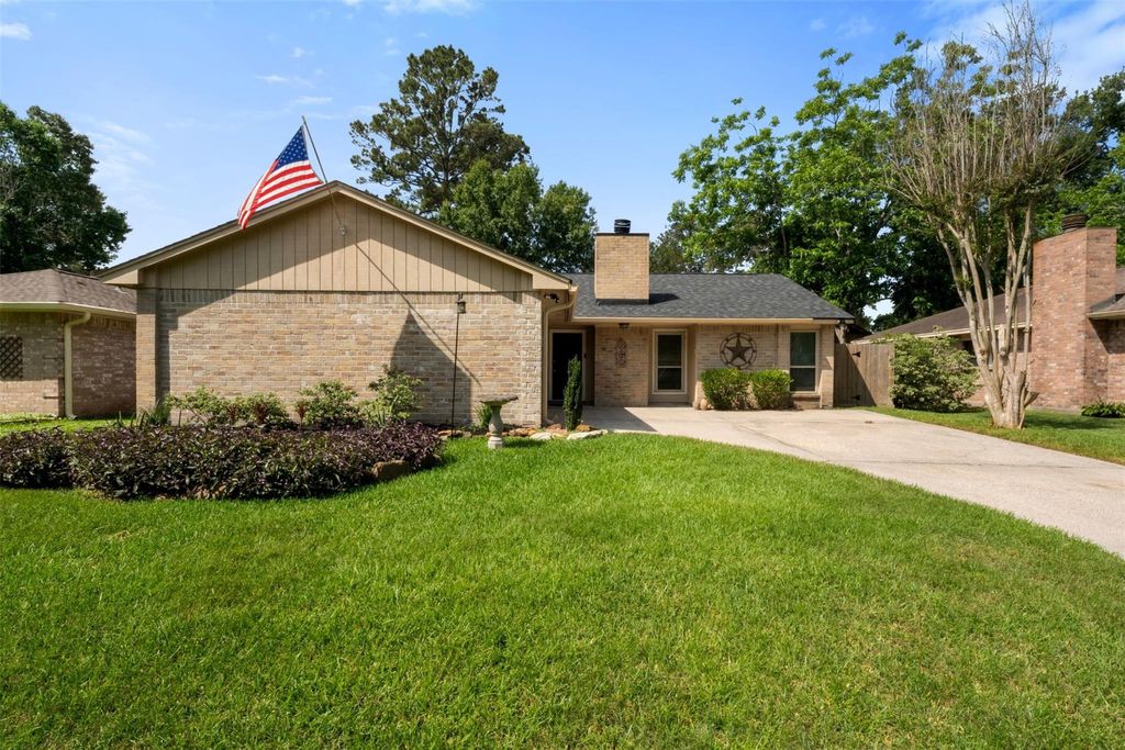 Photo of 4058 Sherwood Street E, Kingwood, TX 77339 (MLS # 59837680)