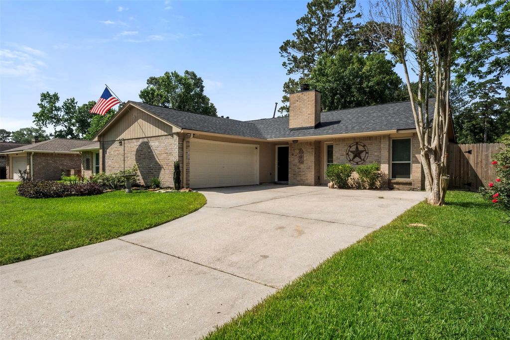 Photo of 4058 Sherwood Street E, Kingwood, TX 77339 (MLS # 59837680)