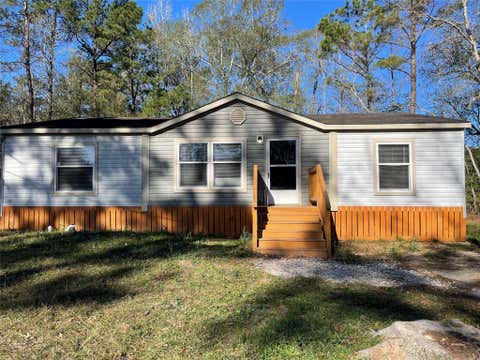 Photo of 13406 Tommy Smith Rd, Conroe, TX 77306 (MLS # 24853351)