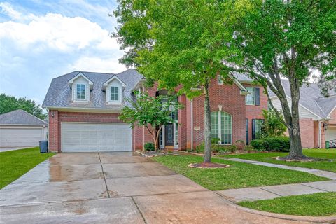 Photo of 22011 Windmill Bluff Lane, Katy, TX 77450 (MLS # 48549948)