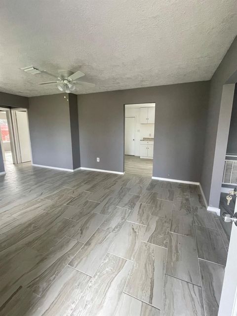 Photo of 5102 Myrtlewood Street, Houston, TX 77033 (MLS # 96221921)