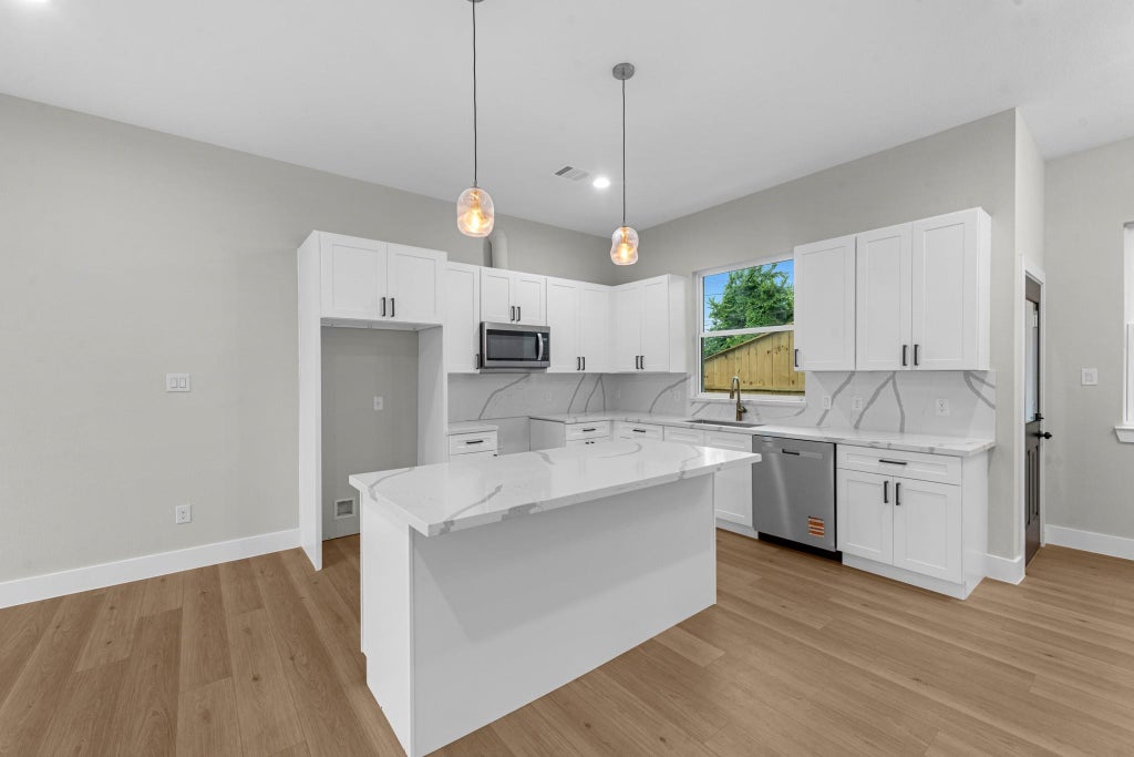Photo of 2348 Delafield Street, Houston, TX 77023 (MLS # 58084366)