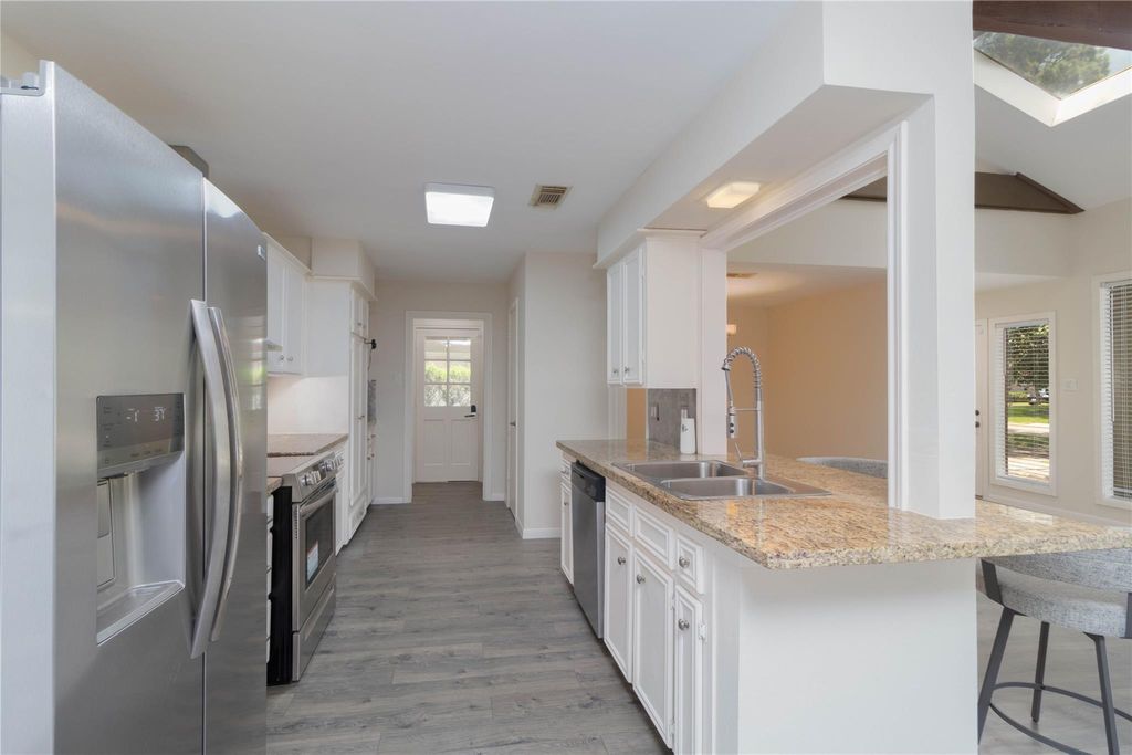 Photo of 1926 Maple Lakes Drive, Houston, TX 77339 (MLS # 83476120)