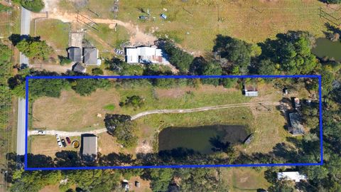 Photo of 27182 E East River Road, Splendora, TX 77372 (MLS # 49089965)