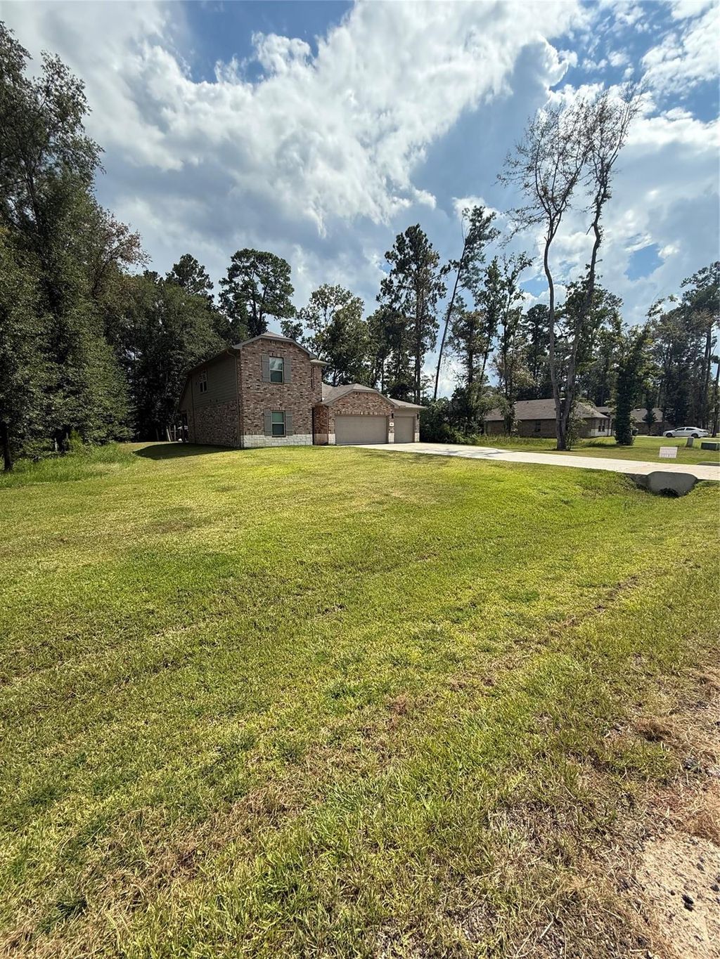 Photo of 2914 Roman Forest Boulevard, New Caney, TX 77357 (MLS # 68453717)