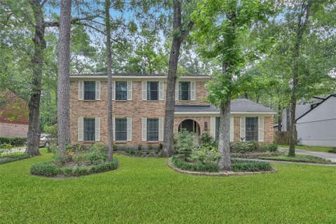 Photo of 14 E Wandering Oak Drive, The Woodlands, TX 77381 (MLS # 43752511)
